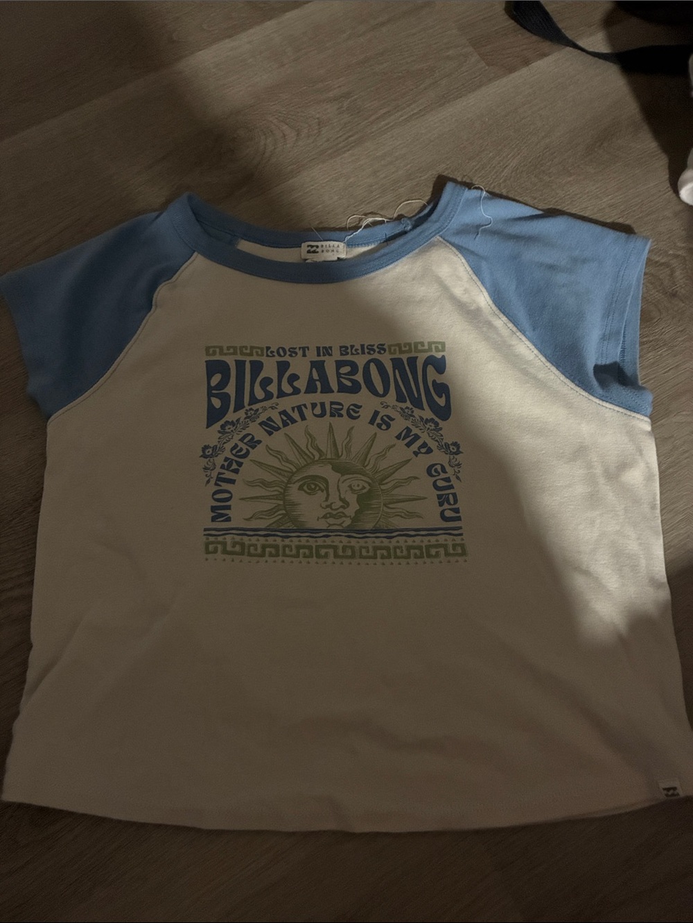 Billabong women’s Cream Tee with Light Blue Raglan Sleeves & Sun Graphic